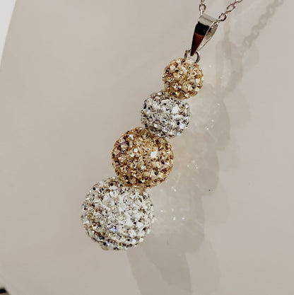 Tresor Paris White and Gold Crystal Necklace Pendant