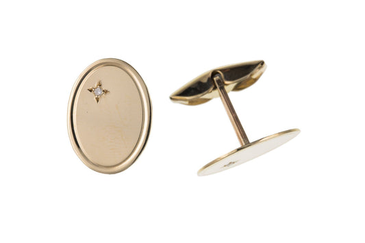 Yellow gold diamond set oval cufflinks