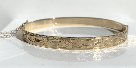 Yellow gold solid half engraved bangle