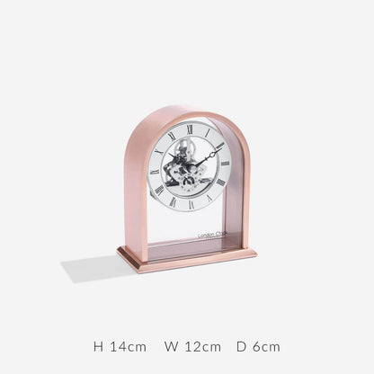 03183 Skeleton Clock Rose Gold Coloured Curved Arch Top Metal And Glass Mantle London Clock Company