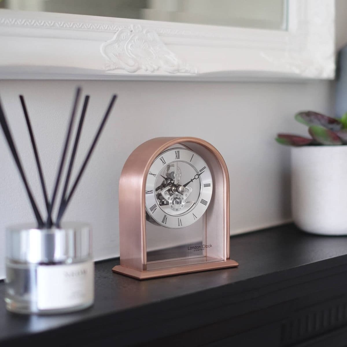 03183 Skeleton Clock Rose Gold Coloured Curved Arch Top Metal And Glass Mantle London Clock Company
