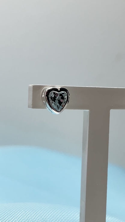 Heart shaped blue topaz sterling silver stud earrings