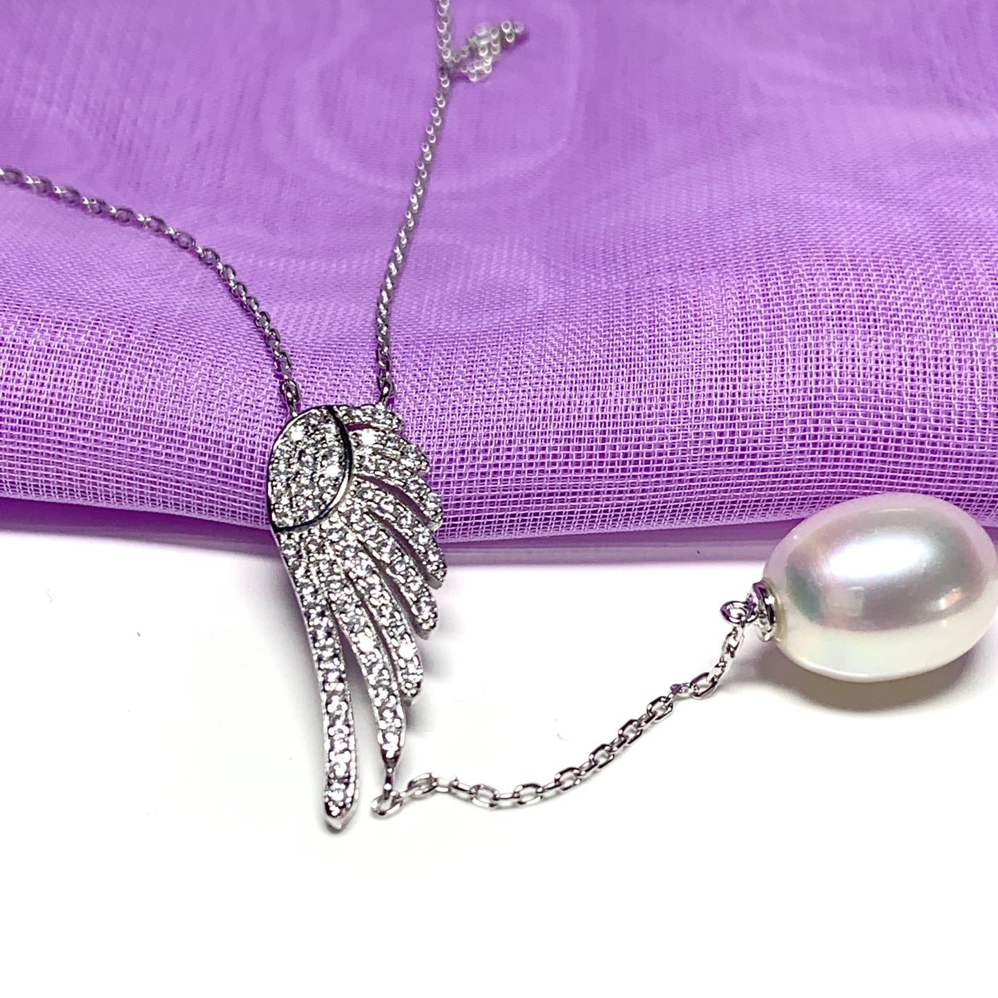 Angle Wing Cubic Zirconia and Fresh Water Pearl Necklace Pendent