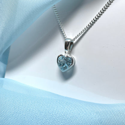 Heart shaped blue topaz sterling silver necklace pendant