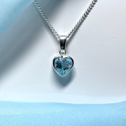 Heart shaped blue topaz sterling silver necklace pendant