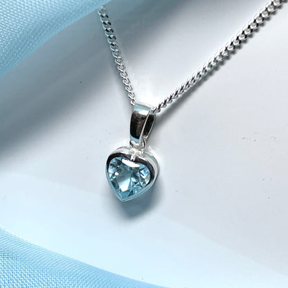 Heart shaped blue topaz sterling silver necklace pendant