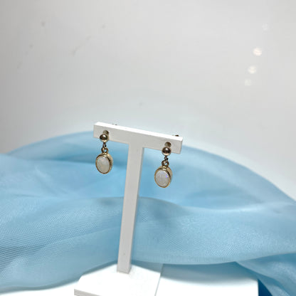 Opal drop oval yellow gold earrings