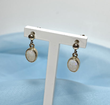 Opal drop oval yellow gold earrings