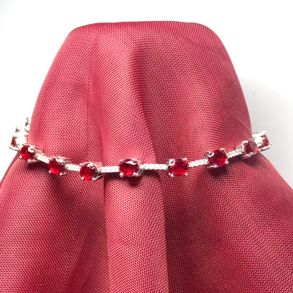 Oval sterling silver red cubic zirconia bracelet