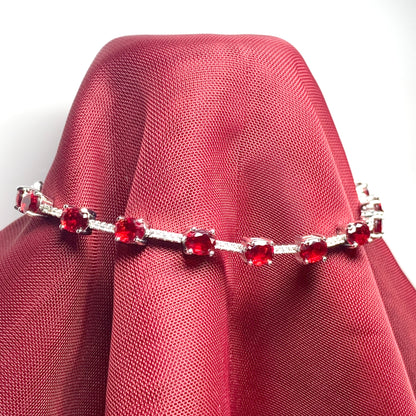 Oval sterling silver red cubic zirconia bracelet