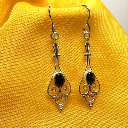 Patterned sterling silver black oval onyx drop earrings