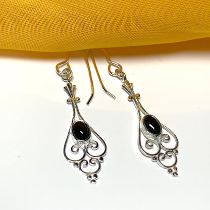 Patterned sterling silver black oval onyx drop earrings