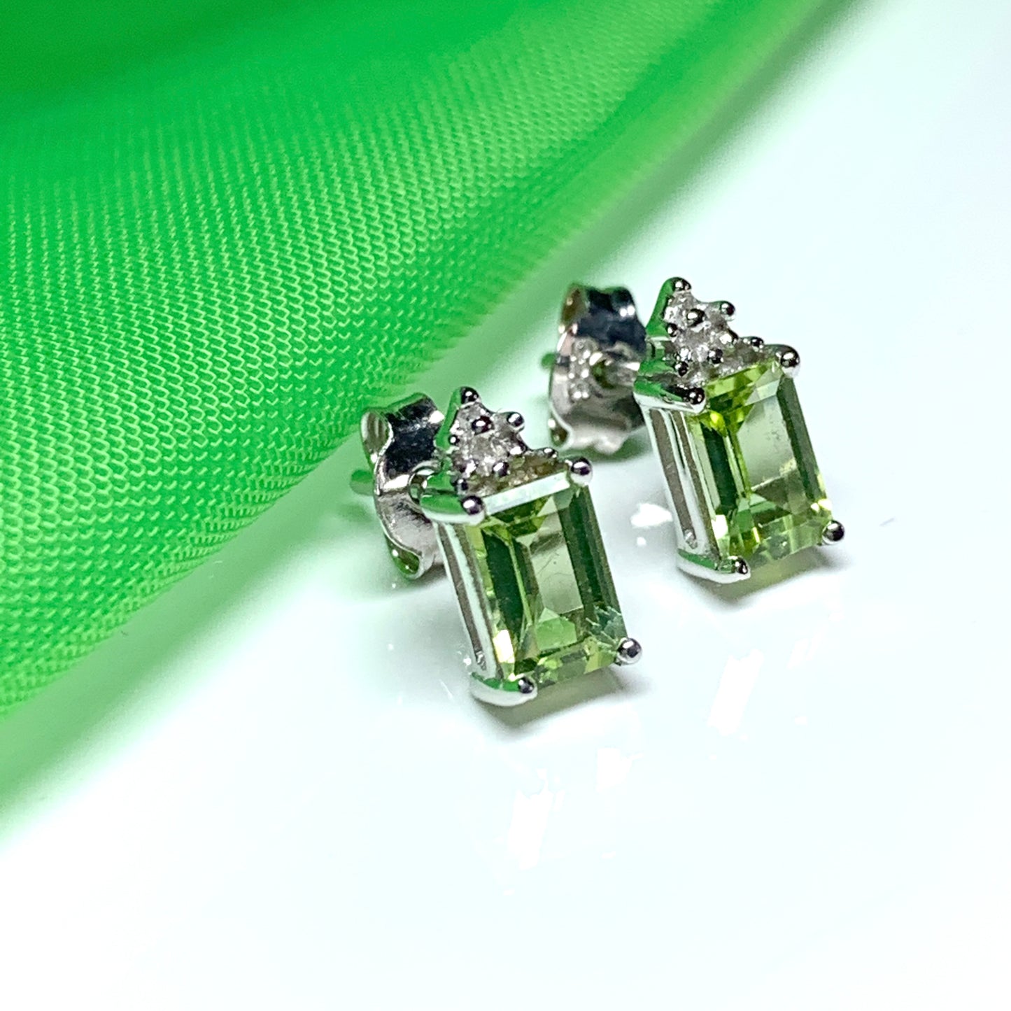 Peridot and diamond silver stud earrings