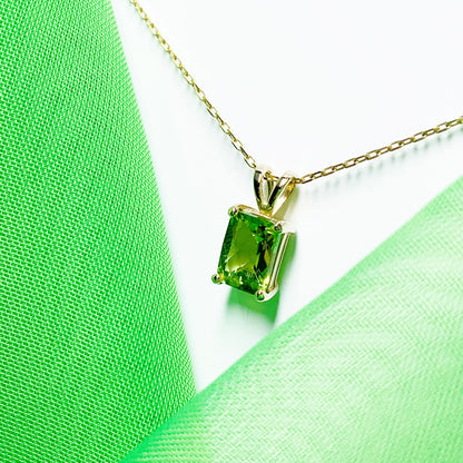 Peridot yellow gold claw set rectangle necklace