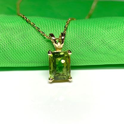 Peridot yellow gold claw set rectangle necklace