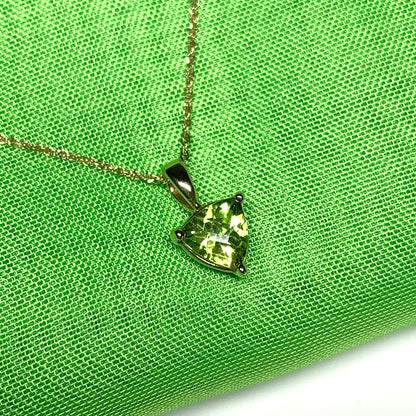 Peridot yellow gold trillion cut necklace