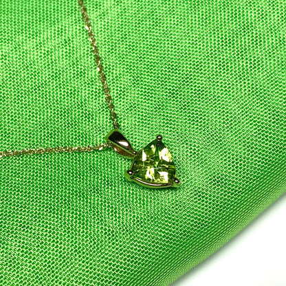 Peridot yellow gold trillion cut necklace