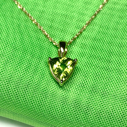 Peridot yellow gold trillion cut necklace