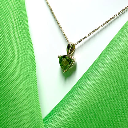 Peridot yellow gold trillion cut necklace