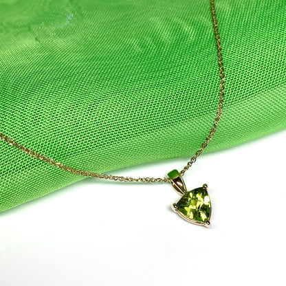 Peridot yellow gold trillion cut necklace