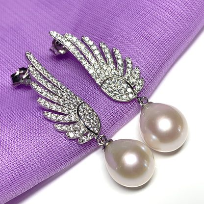 Sterling Silver Angle Wing Stud Earrings with Fresh Water Pearl and Cubic Zirconia