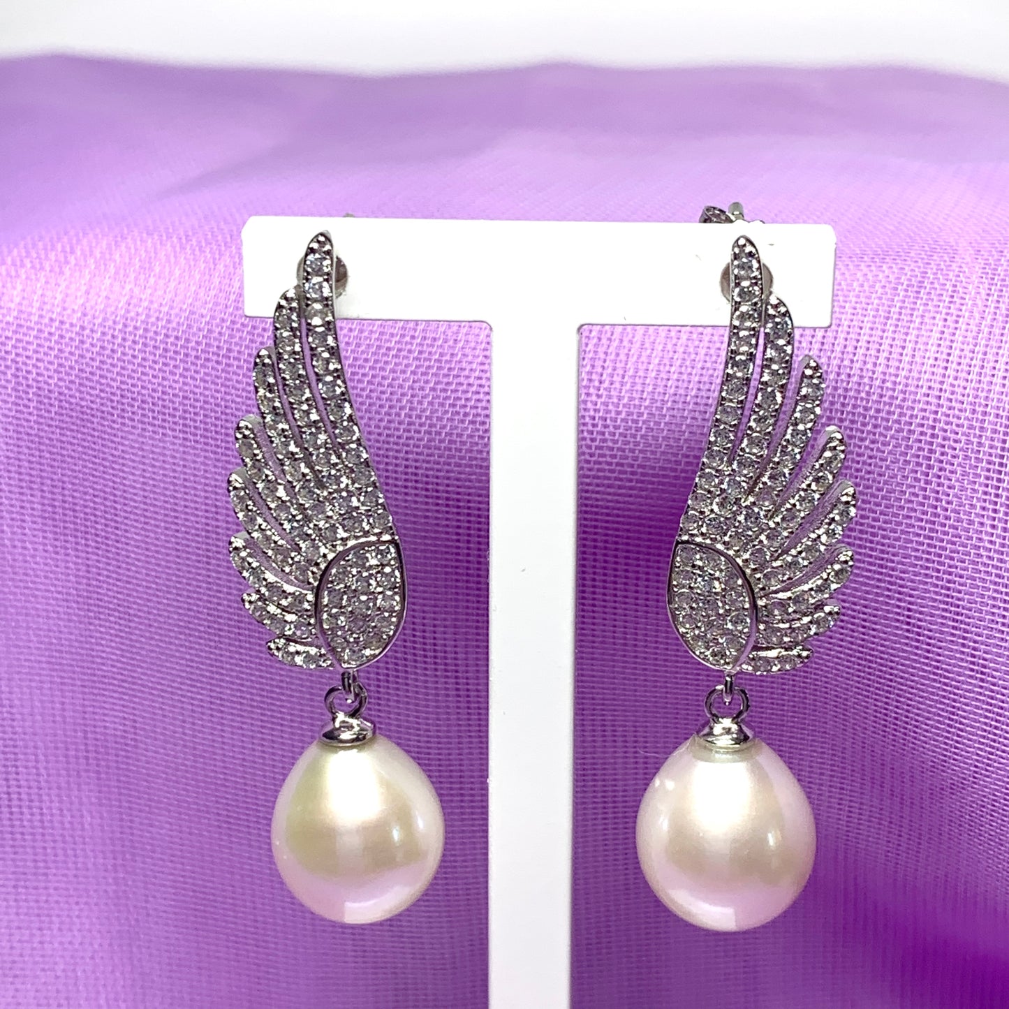 Sterling Silver Angle Wing Stud Earrings with Fresh Water Pearl and Cubic Zirconia