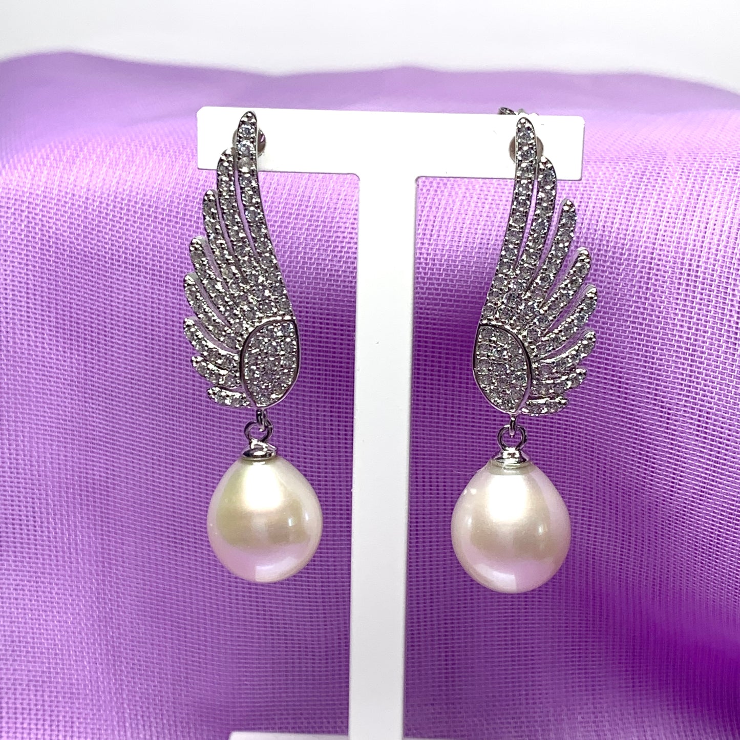 Sterling Silver Angle Wing Stud Earrings with Fresh Water Pearl and Cubic Zirconia