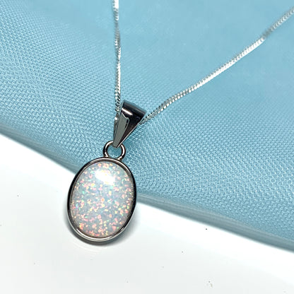 Sterling silver oval opal rubbed over necklace