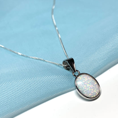 Sterling silver oval opal rubbed over necklace