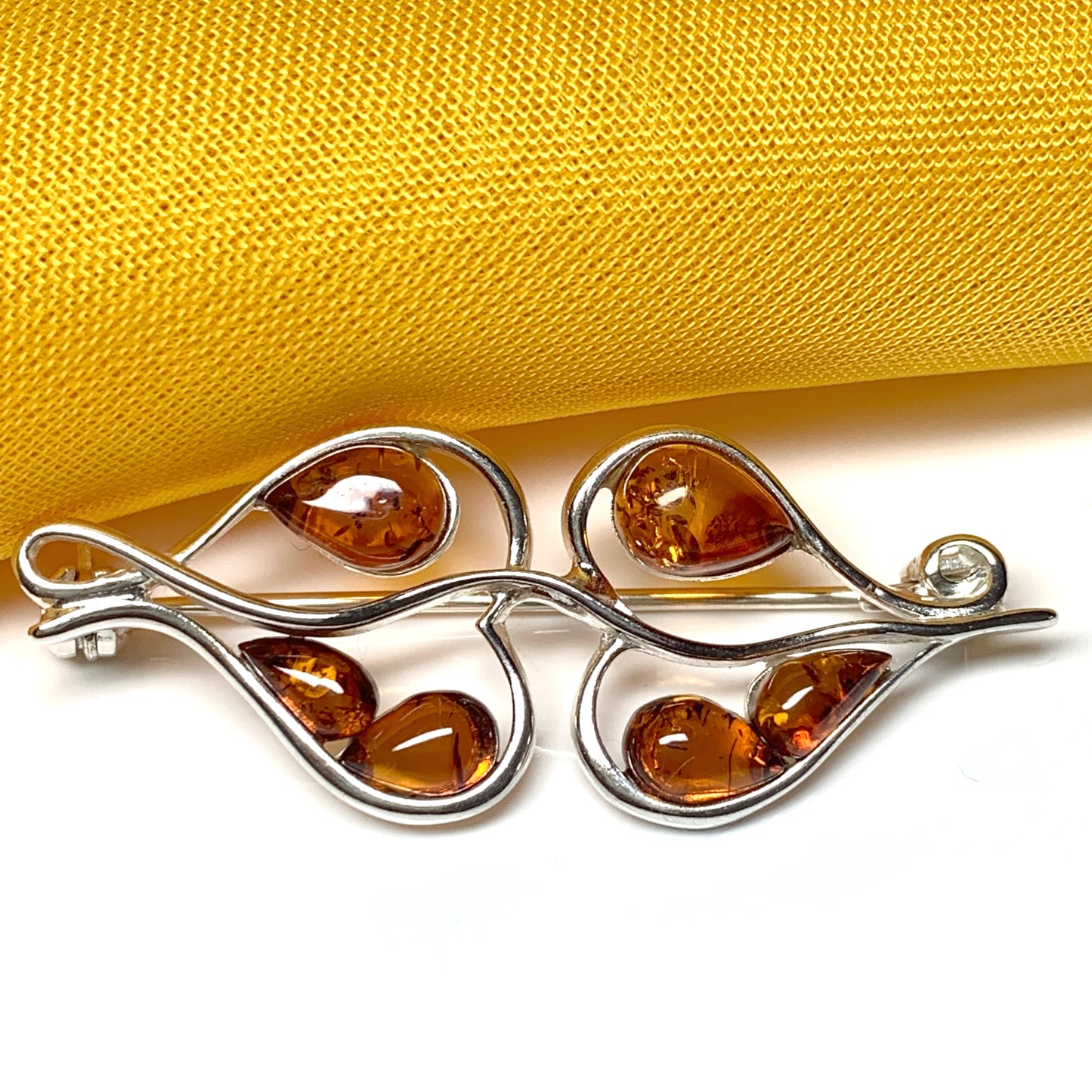 Sterling silver amber fancy brooch