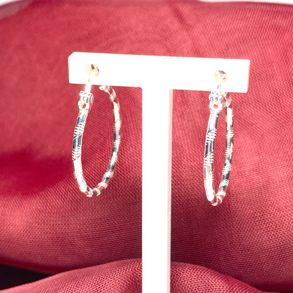 Sterling silver patterned hoop earrings