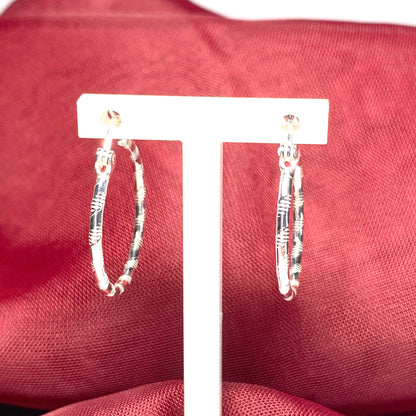 Sterling silver patterned hoop earrings