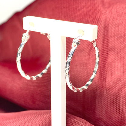 Sterling silver patterned hoop earrings