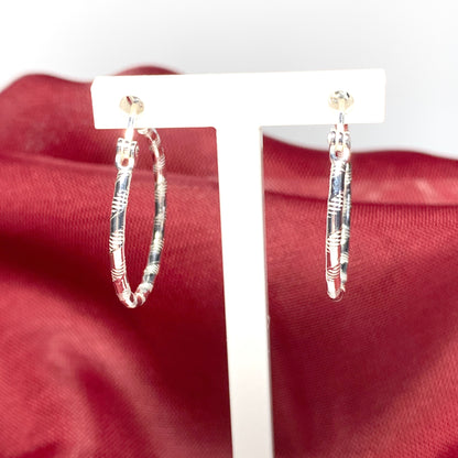 Sterling silver patterned hoop earrings