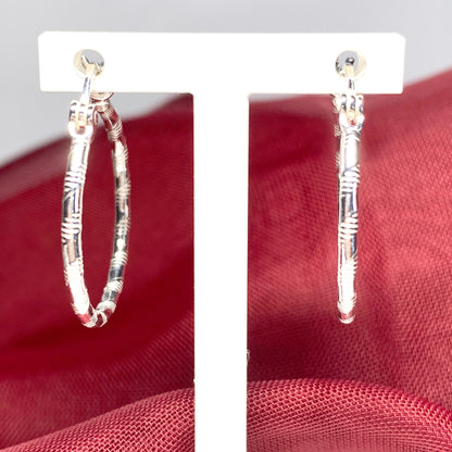 Sterling silver patterned hoop earrings