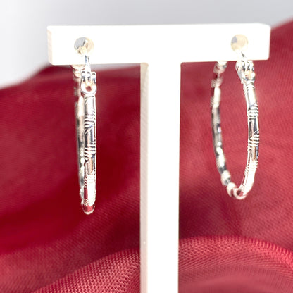 Sterling silver patterned hoop earrings