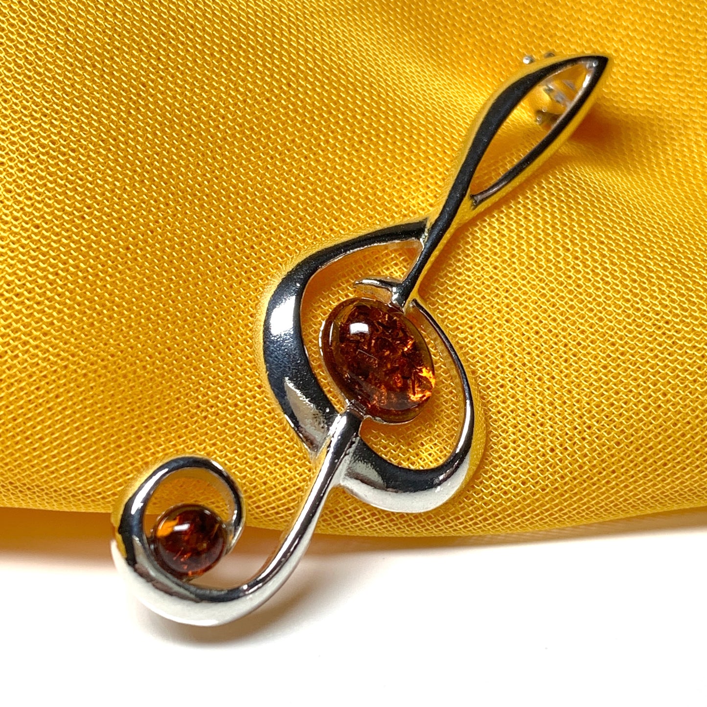 Treble clef musical orange real amber silver brooch