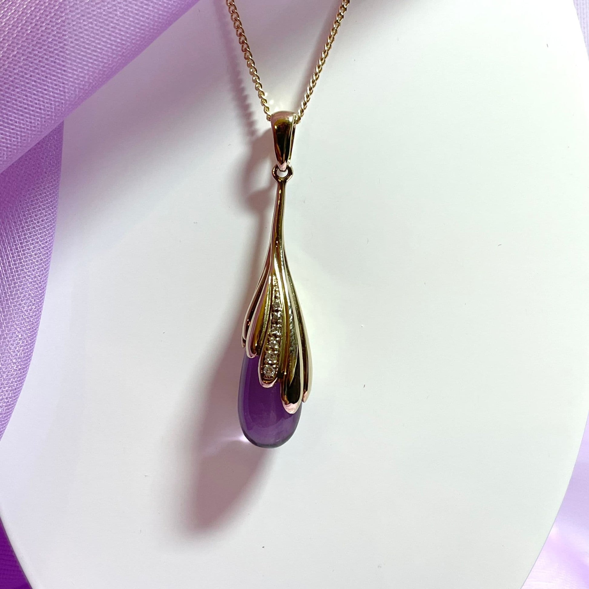 Amethyst and diamond long yellow gold necklace