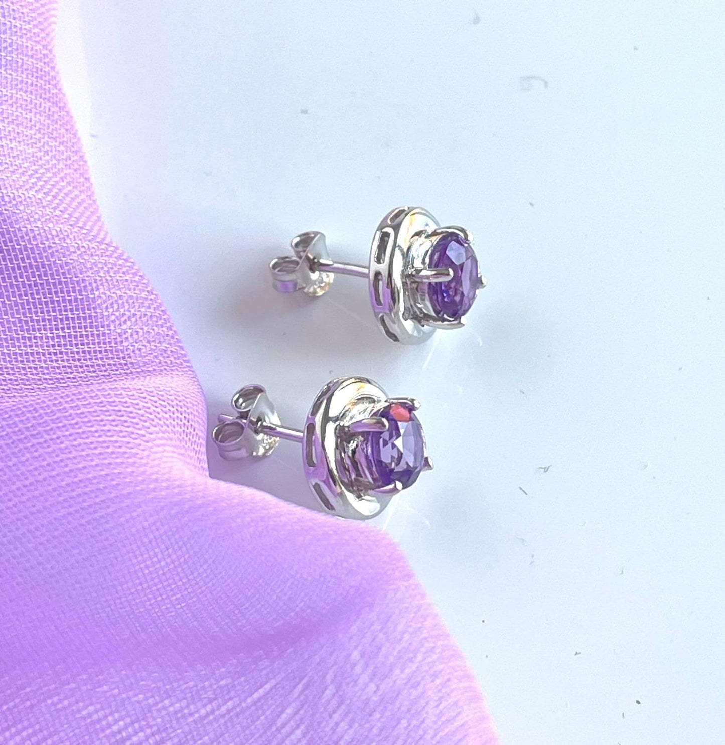 Amethyst and diamond sterling silver round purple stud earrings