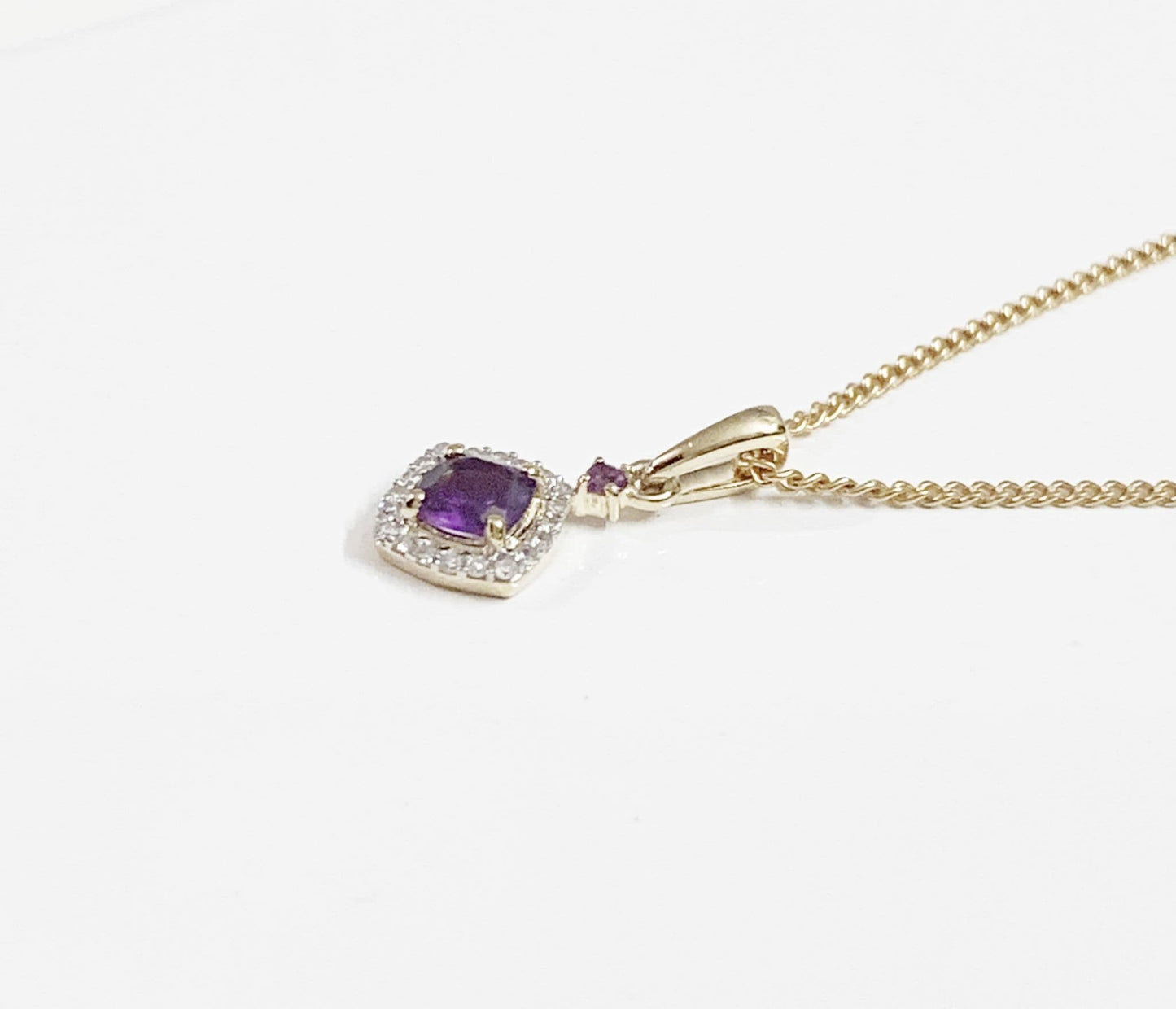 Amethyst and diamond yellow gold cushion cluster necklace