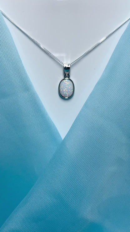 Sterling silver oval opal rubbed over necklace