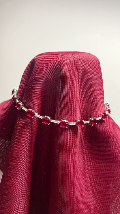 Oval sterling silver red cubic zirconia bracelet