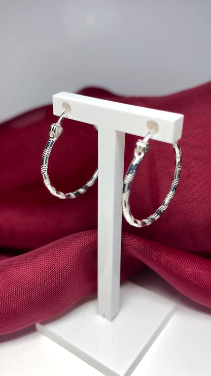 Sterling silver patterned hoop earrings