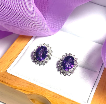 Oval shaped purple amethyst and diamond sterling silver cluster stud earrings