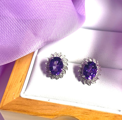 Oval shaped purple amethyst and diamond sterling silver cluster stud earrings