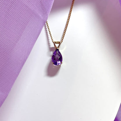 Pear shaped purple amethyst yellow gold necklace