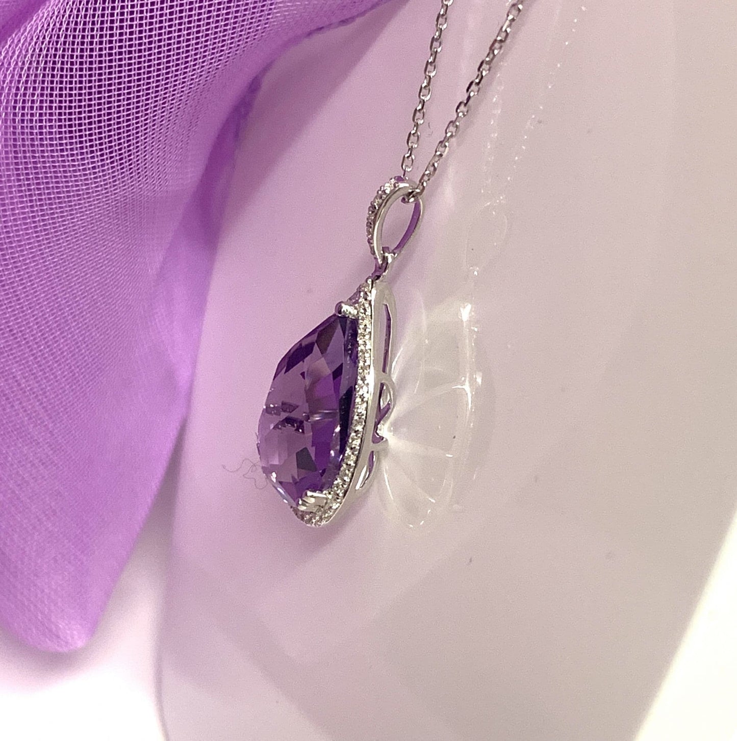Pear teardrop shaped purple amethyst and diamond white gold necklace pendant