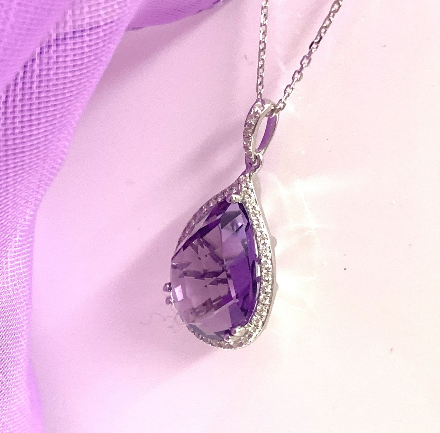 Pear teardrop shaped purple amethyst and diamond white gold necklace pendant