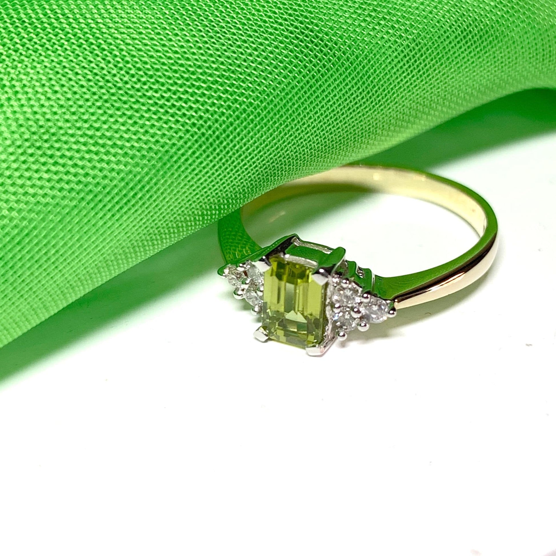 Peridot and diamond dress ring