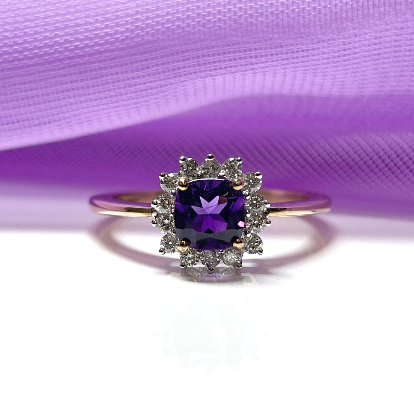 Purple amethyst and diamond cluster dress ring yellow gold